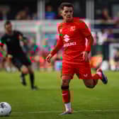 Liam Kelly in action for MK Dons against Wealdstone