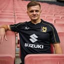 Joe Tomlinson models the new black third strip