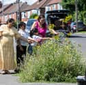 Grace Hills, 36, transformed her street from a 'neglected patch of urban land' into a colourful wildflowers. 