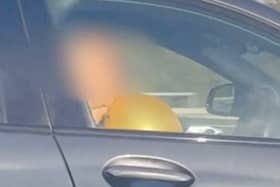 BMW driver filmed inhaling from what appeared to be a 'hippy crack balloon' on the M6.