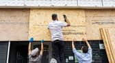 Shops on Old Market Road and West Street in Bristol board up their windows and close early amid planned far-right protests.