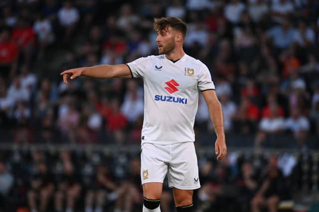 Sam Sherring sliced the ball into his own net five minutes into his MK Dons debut