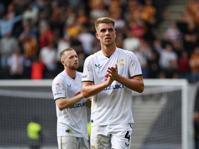 Jack Tucker believes Dons' defence is much stronger this term