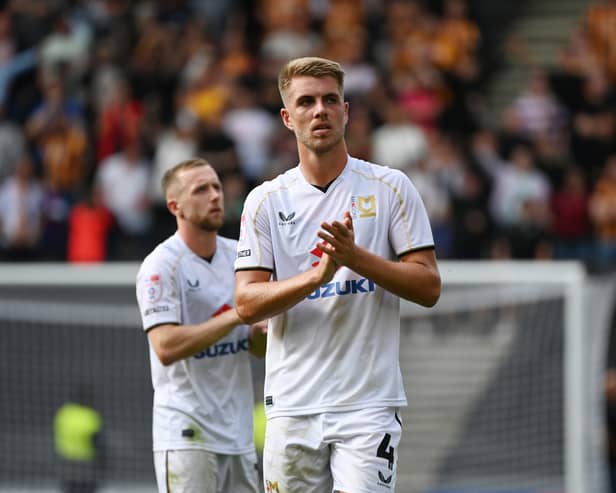 Jack Tucker believes Dons' defence is much stronger this term
