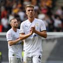 Jack Tucker believes Dons' defence is much stronger this term