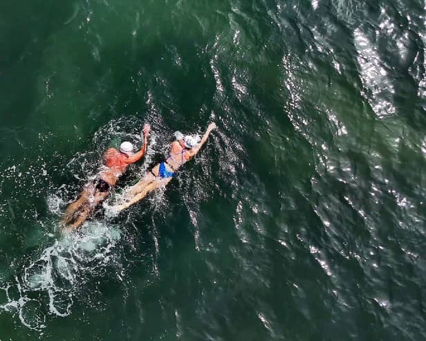 Gerrard Gosens, 54, trains in preparation for his channel crossing swim alongside guide swimmer.
