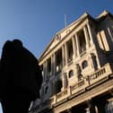 City workers walk past the Bank of England in London (Photo: Leon Neal/Getty Images)