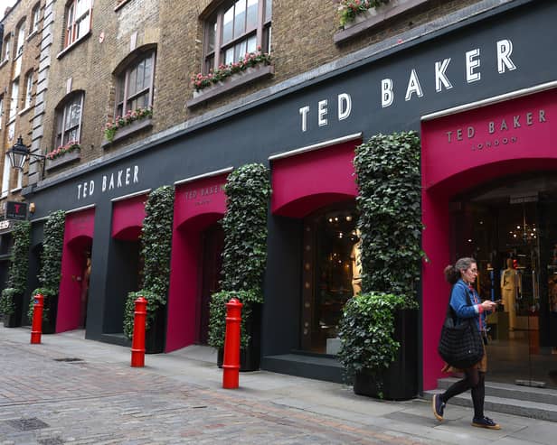 A woman walks past a Ted Baker store in Covent Garden, London (Photo: Peter Nicholls/Getty Images)