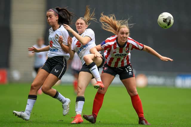 Caitlin Stewart and Madeline Welham battle for the ball against Cheltenham. Pic: CTF Photography