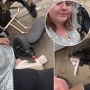 Abbie McMahon, 25, claims she was flung from her wheelchair when the wheel broke after getting stuck in a dropped kerb. 