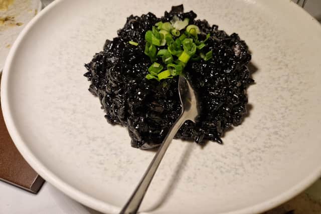 The delightful cuttlefish ink risotto with syglino pork from Thea Thalassa.