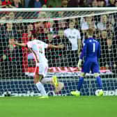 Will Grigg scored a famous double ten years ago for MK Dons in the 4-0 win over Manchester United
