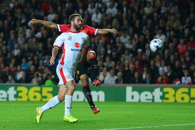 Will Grigg's infamous chested goal against Manchester United is one of the most unique goals in the club's history