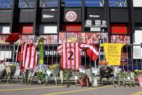 Tributes to George Baldock outside Bramall Lane