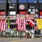 Tributes to George Baldock outside Bramall Lane