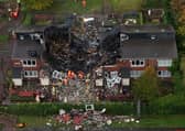 Three adults and one child have been rushed to hospital after a large fire destroyed a house in Newcastle. 