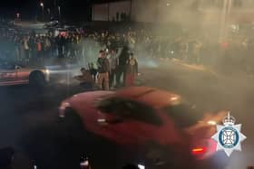 Video shows a man drifting then crashing with parked cars as well as injuring a member of the public.