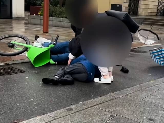 E-bike rider crashes into a child crossing a cycle lane to reach a "floating" bus stop.