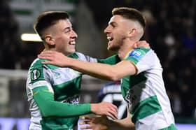 Darragh Burns celebrates with Dylan Watts