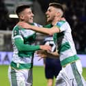 Darragh Burns celebrates with Dylan Watts
