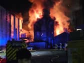 Firefighters tackling a huge fire at the former Dog Inn on Church Street, Preston