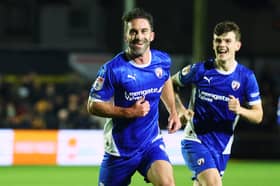Will Grigg spent three spells at MK Dons