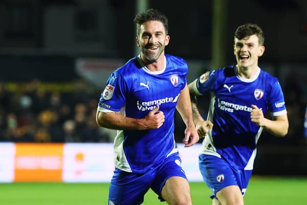 Will Grigg spent three spells at MK Dons