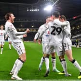 MK Dons celebrate Scott Hogan's goal after 12 seconds