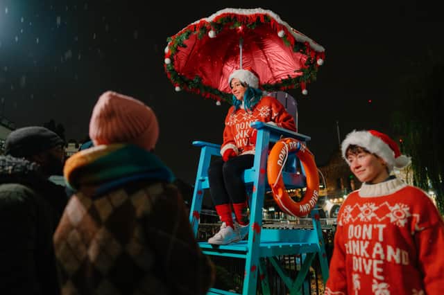 Seasonal lifeguard towers – complete with baubles and jolly decorations - spotted near water across London, Manchester and Bristol