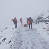 Injured man rescued from snow-covered mountain