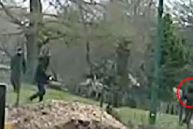 Harrowing CCTV shows the final moments of a teenager's life as he fled two thugs who stabbed him in a park in broad daylight.