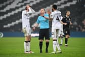 Paul Durkin waves away MK Dons' penalty appeals