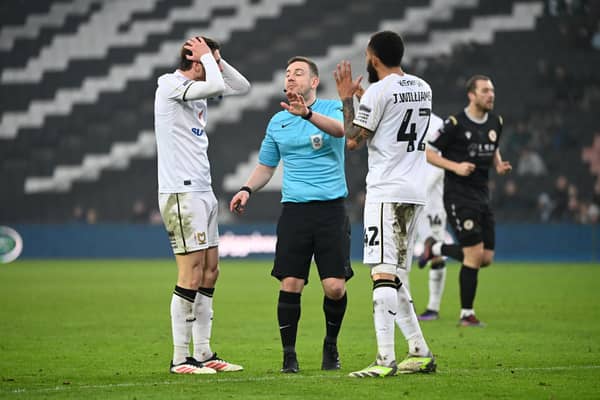 Paul Durkin waves away MK Dons' penalty appeals