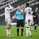 Paul Durkin waves away MK Dons' penalty appeals