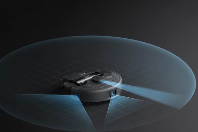 The handheld vacuum actually sits inside the robot vacuum
