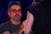 Simon Cowell was visibly shocked during Auzzy Blood's Britain's Got Talent performance.