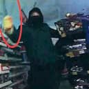 Bornworn footage shows Callum Knox charge at police armed with a crowbar during supermarket robbery in  Sevenoaks, Kent, November 22 2024. 