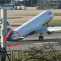 Tail of British Airways jet hits runway during aborted landing.