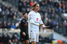 Danilo Orsi urging his team-mates to calm down