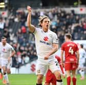 Danilo Orsi celebrates his first MK Dons goal at Stadium MK