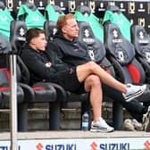 Dean Lewington and Callum Hendry
