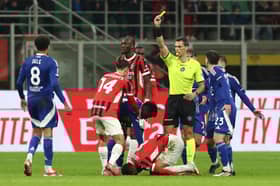 Dele Alli being shown a yellow card early into his Como debut