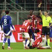 Dele Alli being shown a yellow card early into his Como debut