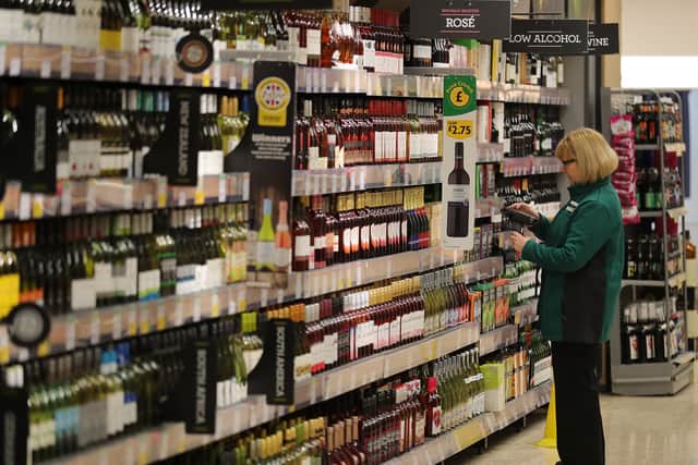 A member of staff scans groceries inside Rochdale's Morrisons supermarket in 2017 (Photo: Christopher Furlong/Getty Images)