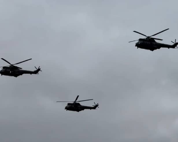 Puma helicopters fly over RAF Cosford.