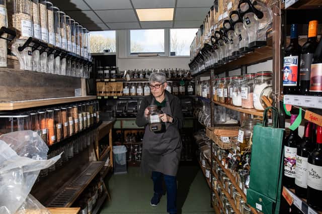 Moira Whittaker, volunteer working in the community shop, Trawden.