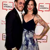 The wife of Weezer bassist Scott Shriner has been booked for attempted murder after an altercation with Los Angeles police on Monday afternoon.