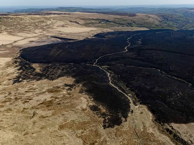 Aerial views show the aftermath after three blazes broke out at March Haigh Reservoir in Marsden. 