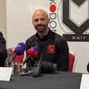 MK Dons head coach Paul Warne with MK Dons CEO Neil Hart and Sporting Director Liam Sweeting