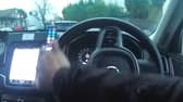 Disqualified driver jumps from moving car during police chase.